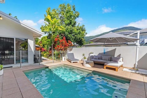 Immerse yourself in the refreshing waters of the private pool surrounded by lush tropical greenery. The pool can be heated in winter for your comfort.