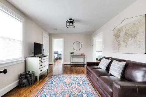 Step into comfort with chic leather furniture, a flat-screen Roku TV, and a welcoming vibe. Centrally located for easy access to all bedrooms, it’s the perfect space to relax after a day of exploring.