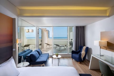 Club Room | Minibar, in-room safe, individually decorated, desk