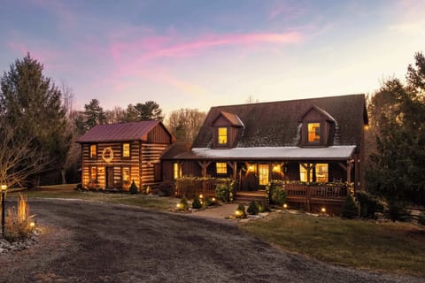 Arrive at The Royal Cabin as sunset lights the 1789 logs—your private Shenandoah retreat begins here.