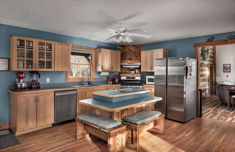 The heart of the home—fully stocked farmhouse kitchen with a big island for cooking together.
