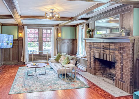 Experience timeless elegance in this spacious living room.