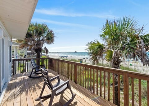 True oceanfront home with the beach right out back