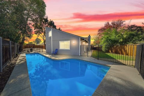 The private and fenced in pool is perfect for lounging outside or swimming a few laps 