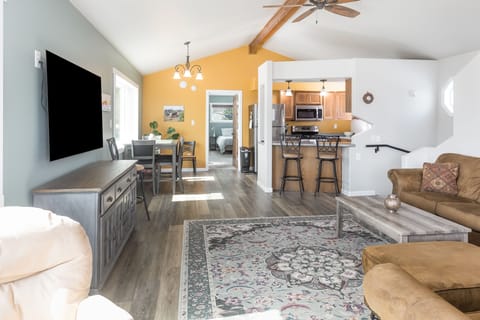 Living room looking into kitchen and master bedroom