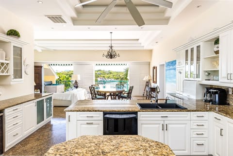 Open luxury kitchen overlooks the water