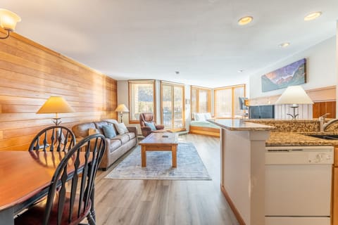 Your spacious mountain retreat combines rustic charm with modern comfort. Warm wood accents and natural light create the perfect alpine getaway.