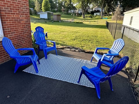 Huge newly fenced backyard and patio.