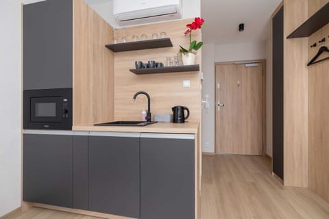 A closer look at the kitchen space, emphasizing the modern appliances and layout.
