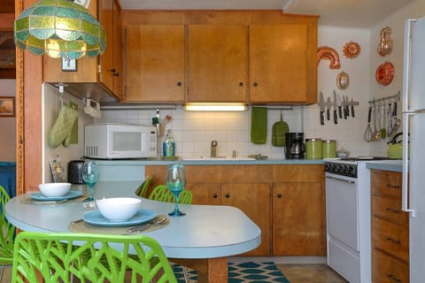 Kitchenette: sink, microwave, toaster coffeepot, teakettle