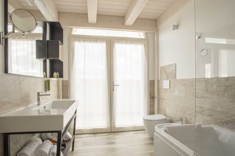 Suite | Premium bedding, down comforters, desk, laptop workspace