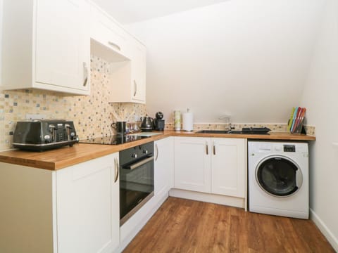 Fridge, electric kettle, toaster, cookware/dishes/utensils