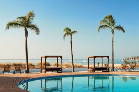 Beach nearby, free beach shuttle, sun loungers