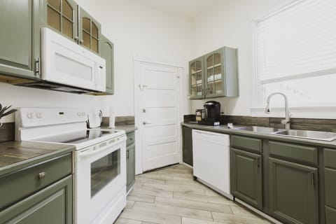 The first floor kitchen is outfitted with basic essentials.