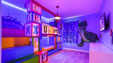 Kids will love the upstairs bedroom with a cool Toy Story theme.