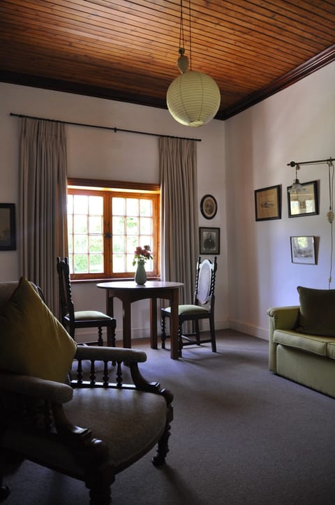 Mountain View Suite | Living area | 28-inch TV with cable channels