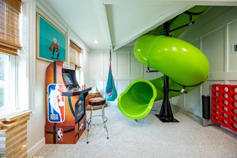 The Green Monster spits you out into this awesome game room