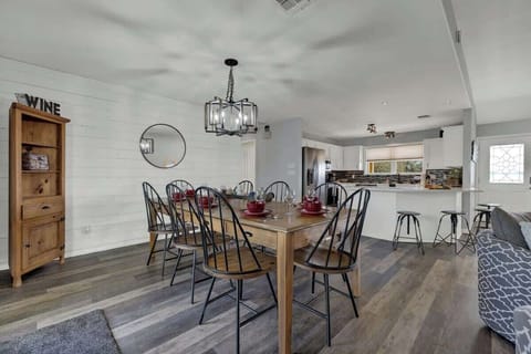 Seating for eight and the dinner table.