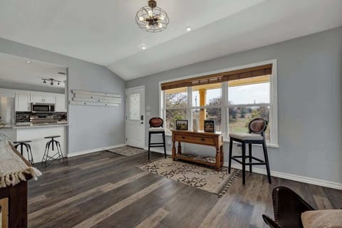 Bright entryway with seating for two.