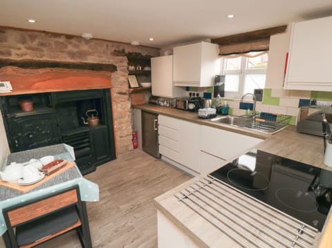 Fridge, electric kettle, toaster, cookware/dishes/utensils