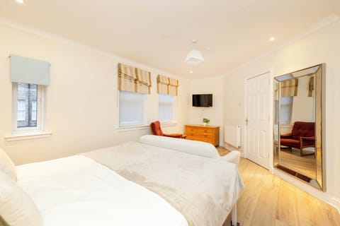 Apartment, 2 Bedrooms | 2 bedrooms, desk, laptop workspace, iron/ironing board