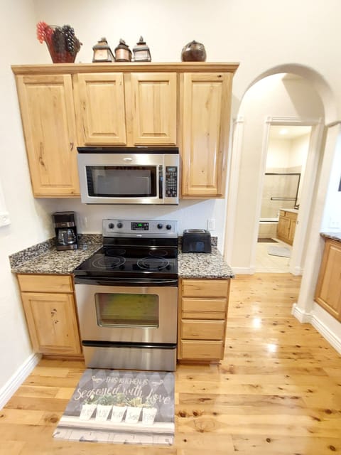 Full-sized, stainless-steel appliances in the kitchen & comes fully stocked!