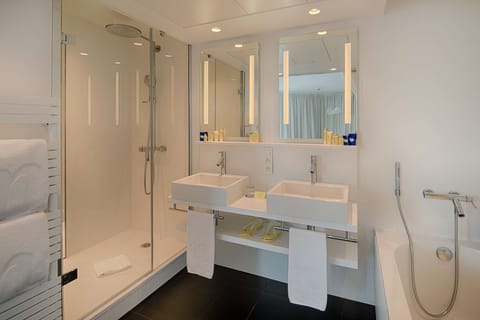 Shower, rainfall showerhead, eco-friendly toiletries, hair dryer