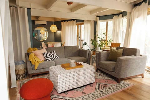 Walk into serenity at Sweet William - our first floor entry features a super comfy Article sofa + chair. 