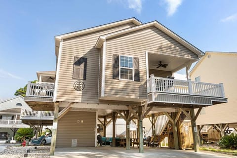 Spacious elevated home with sunny balconies and open-air living