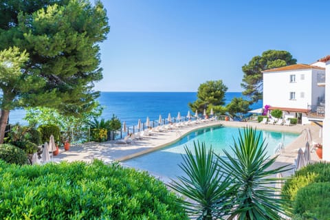 Outdoor pool, open 10:00 AM to 5:00 PM, pool umbrellas, sun loungers