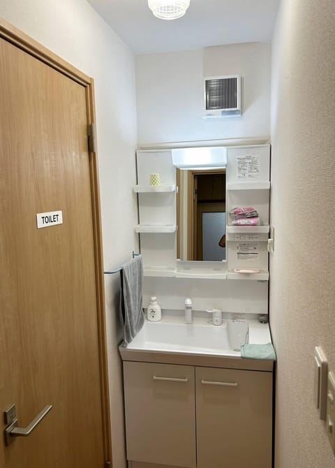 Toilet and sink with washlet