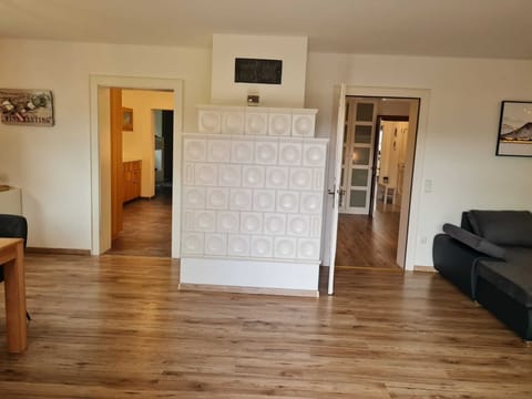 Deluxe Condo | Living area | 32-inch flat-screen TV with satellite channels, TV