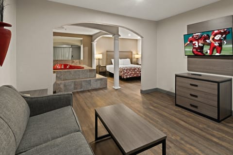 Suite, 1 King Bed with Sofa bed, Non Smoking, Jetted Tub | Desk, laptop workspace, blackout drapes, rollaway beds