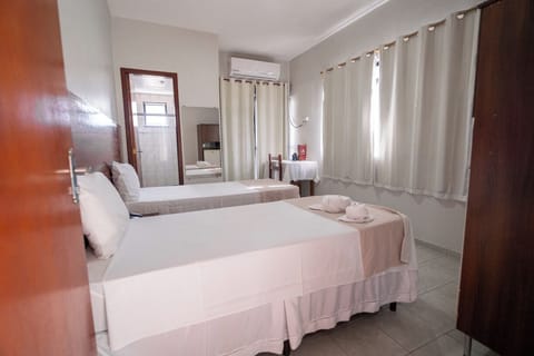 Standard Room, 2 Twin Beds | Minibar, desk, laptop workspace, bed sheets