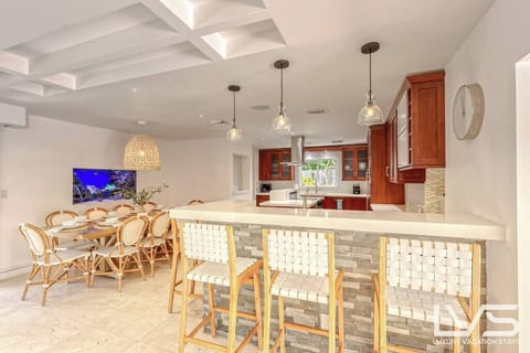 Open layout Kitchen, Eat In Kitchen & Dining Area with seating for 10 plus 3 Bar Seats.