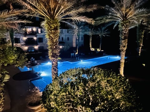 View from balcony at night with waterfall sound