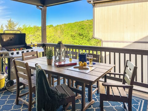 Seamlessly transition from indoor comfort to outdoor relaxation with easy access to the scenic deck.