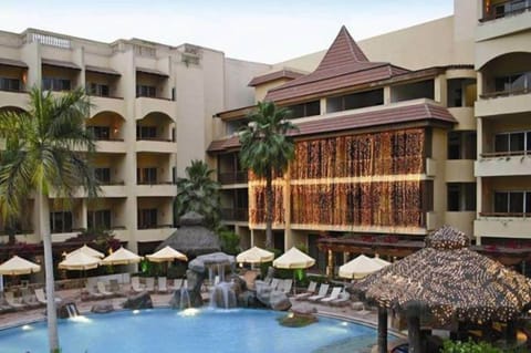 Outdoor pool, open 10:00 AM to 6 PM, pool umbrellas, sun loungers