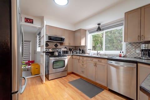 Prepare your favourite meals at the spacious, fully equipped kitchen.