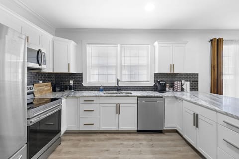 Kitchen has new appliances, complimentary coffee, and anything you need to make a meal.