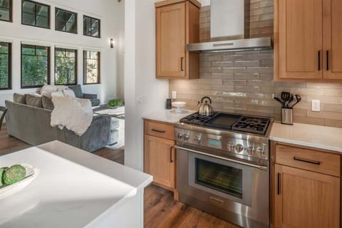 Fully appointed kitchen adjacent to the dining and living area