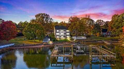 Settle into this tranquil lakeside porch, where plush seating and beautiful water views create the perfect retreat.