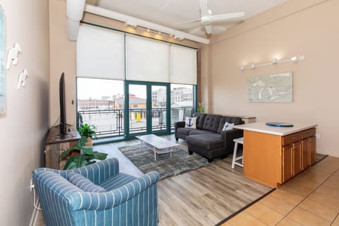Relax in your stylish living space withlake views through floor-to-ceiling windows and modern comforts. You can also see Cedar Point!