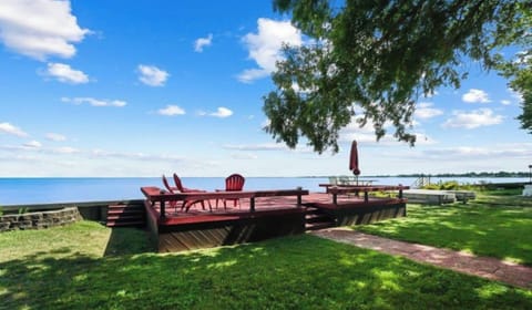 Welcome to your deck right on the Great Lake Erie! It`s just outside of your very own Log Cabin cottage house! This original 100 year old Log Cabin was just newly restored to its original 1920`s luster!