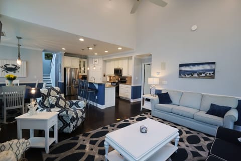 This 1st family room features comfortable seating and a queen size sofa bed.