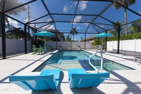 Salt water heated pool with spa and sun shelf