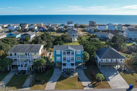 From the Back Porches keep an eye out for the Cargo Ships headed into the Mouth of the Cape Fear headed to the Port of Wilmington.