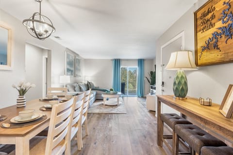 Beautiful dining area looking out to living room and outside patio area