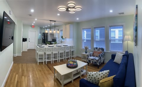 Open living room and kitchen. Perfect for gathering. 
