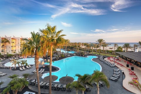 2 outdoor pools, pool umbrellas, sun loungers